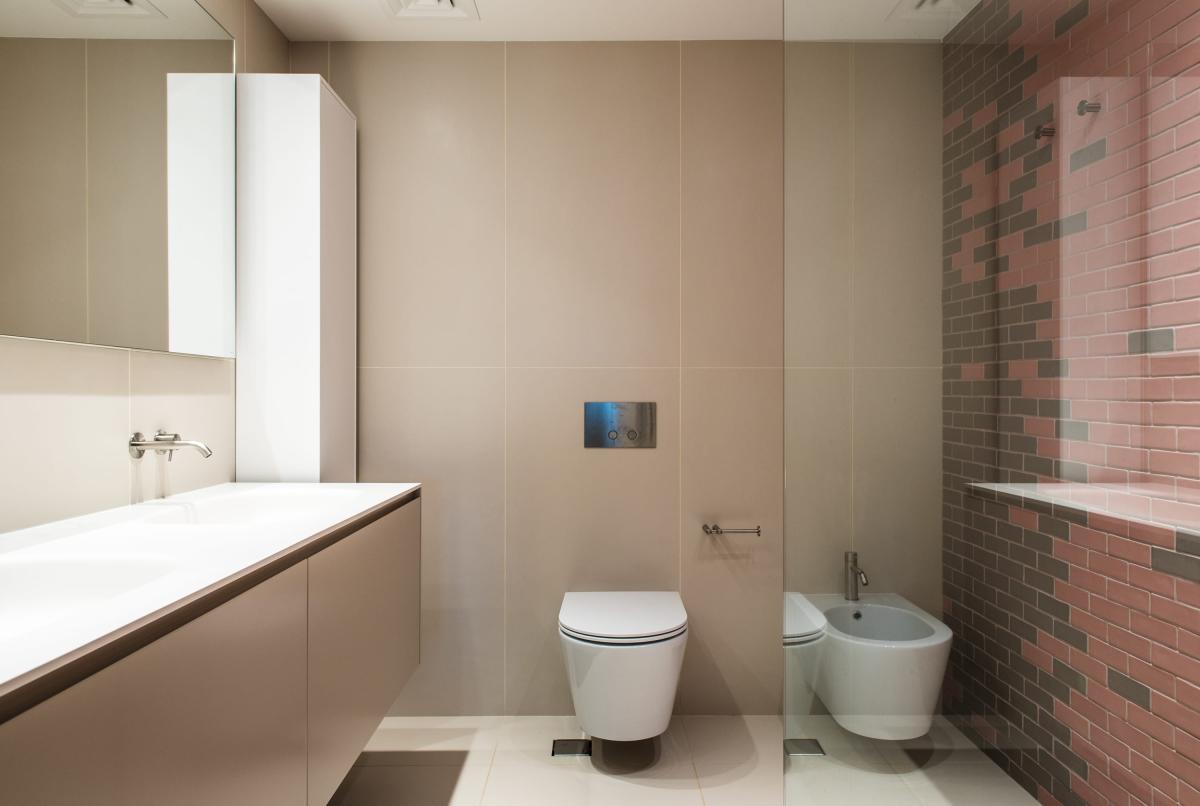 Bathroom with a glass shower, stone vanity, and a pink brick accent wall, Al Fairooz Marina, Three Bedrooms, Dubai Marina, Dubai