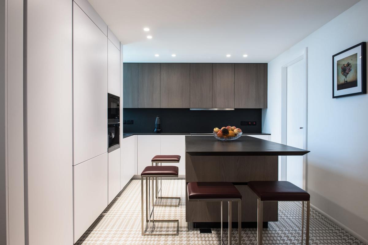 Kitchen with a dark island, cream cabinetry, and patterned tile floor, Al Fairooz Marina, Three Bedrooms, Dubai Marina, Dubai