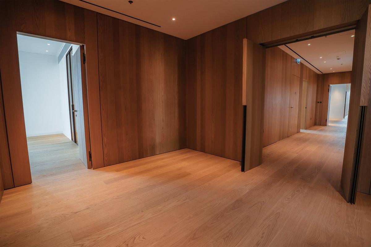 Empty wood-panelled corridor, Bulgari Penthouse Building, Bulgari Island, Dubai