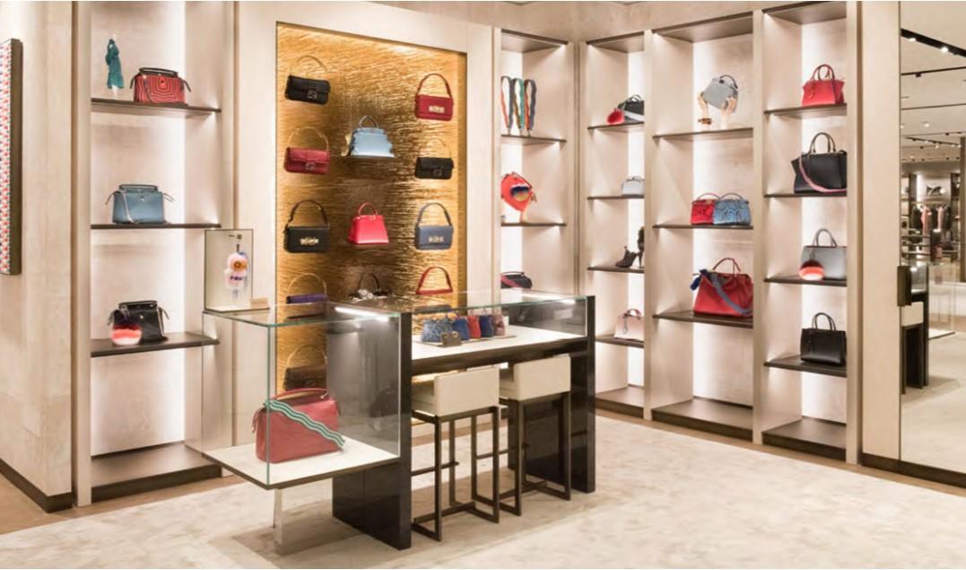 Shop floor with handbag display shelving and a central table, Fendi Boutique Shop, Mall of the Emirates, Dubai