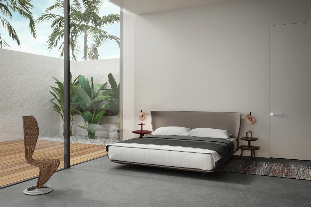Bedroom with a grey upholstered bed opening onto a courtyard, Jumeirah Beach Villa, Jumeirah 1, Dubai