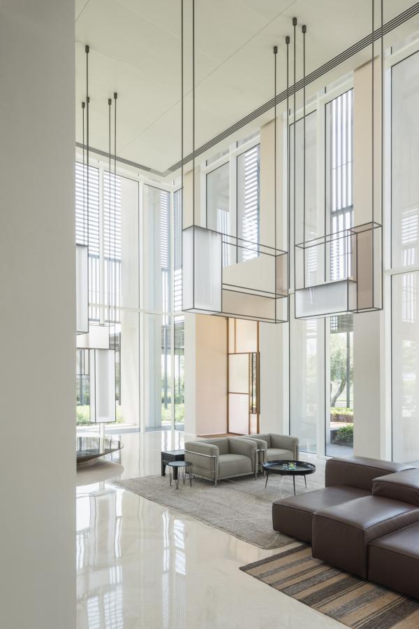Double-height atrium with glass and timber screen walls, Oberoi Resort, Ajman