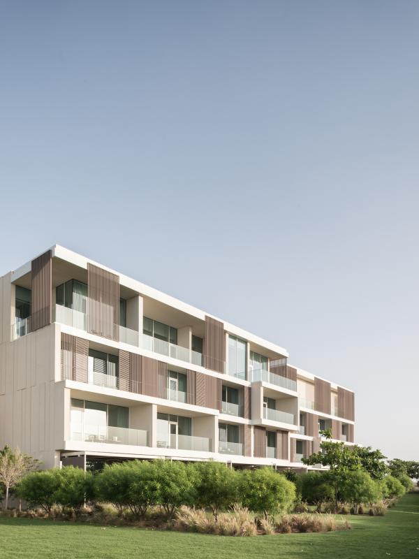 Hotel building facade with timber slat balconies, Oberoi Resort, Ajman