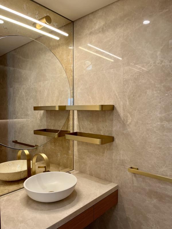 Bathroom with a brass shower fixture and a beige marble wall, One at Palm, Four Bedrooms, Palm Jumeirah, Dubai