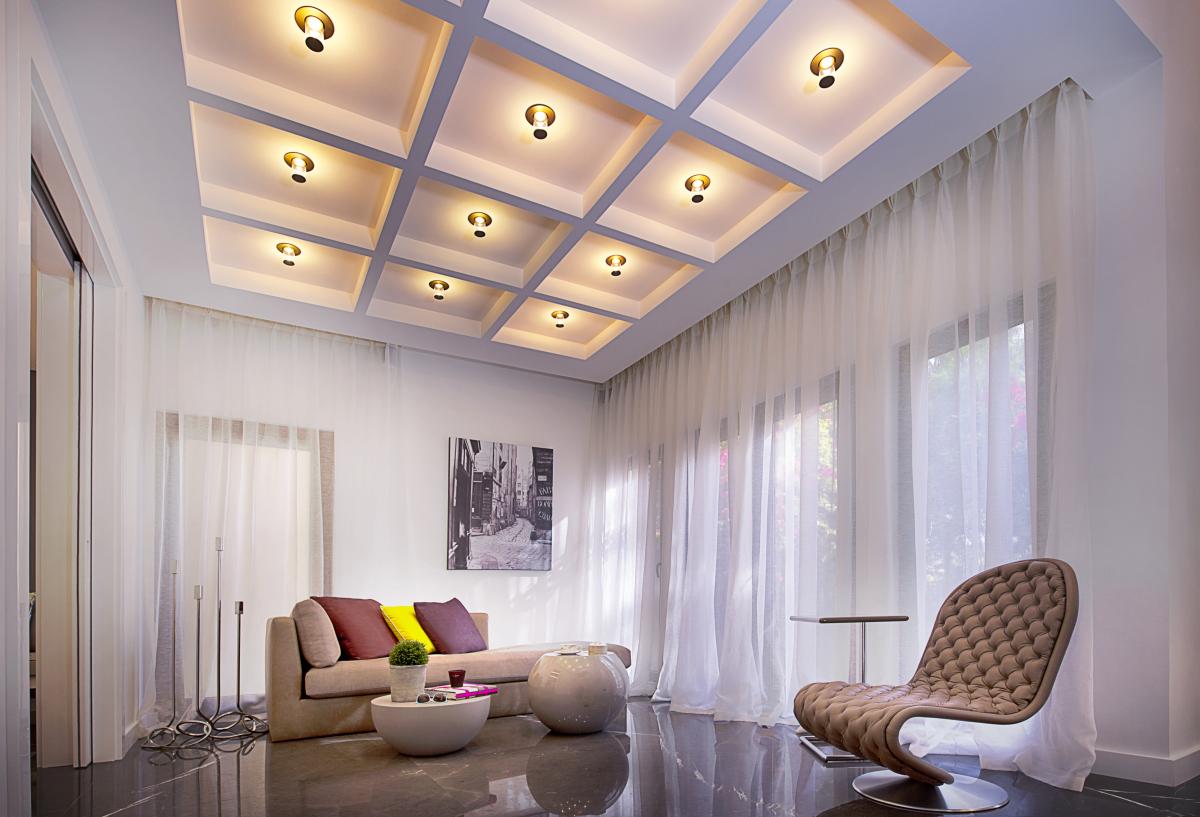 Living room seating area with coffered ceiling, Villa Canal Cove, Palm Jumeirah
