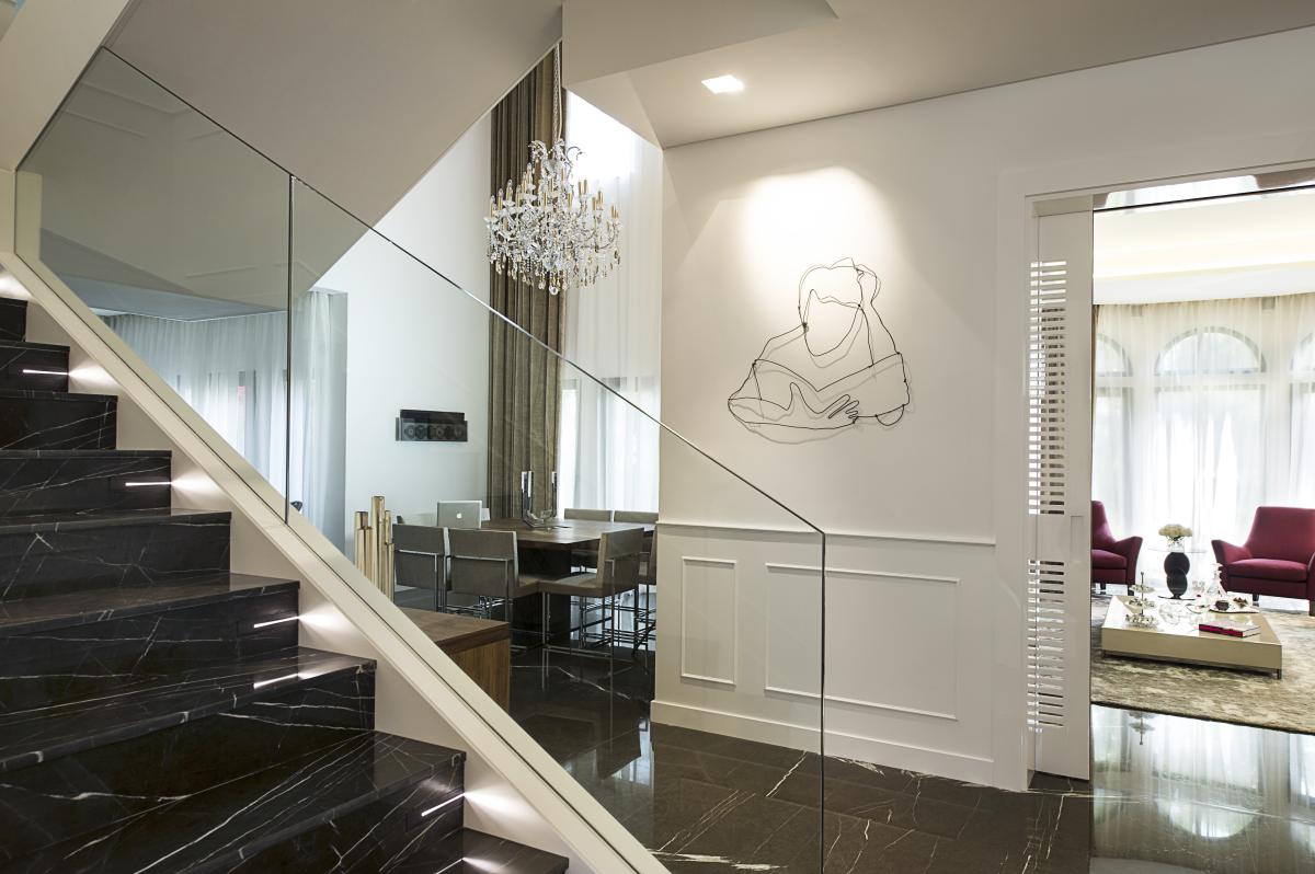 Staircase with glass balustrade over dark marble steps, Villa Canal Cove, Palm Jumeirah